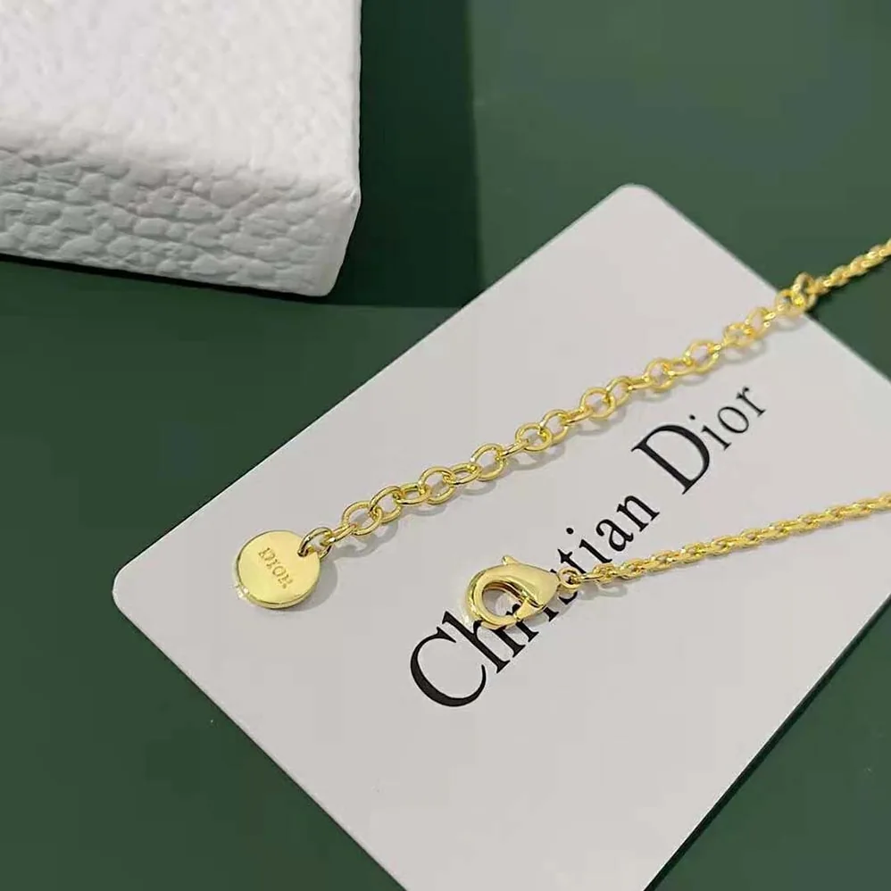 Dior Dio(r)evolution Necklace Gold-Finish Metal with a White Resin Pearl for Women Dior Dio(r)evolution Necklace Gold-Finish Metal with a White Resin Pearl for Women