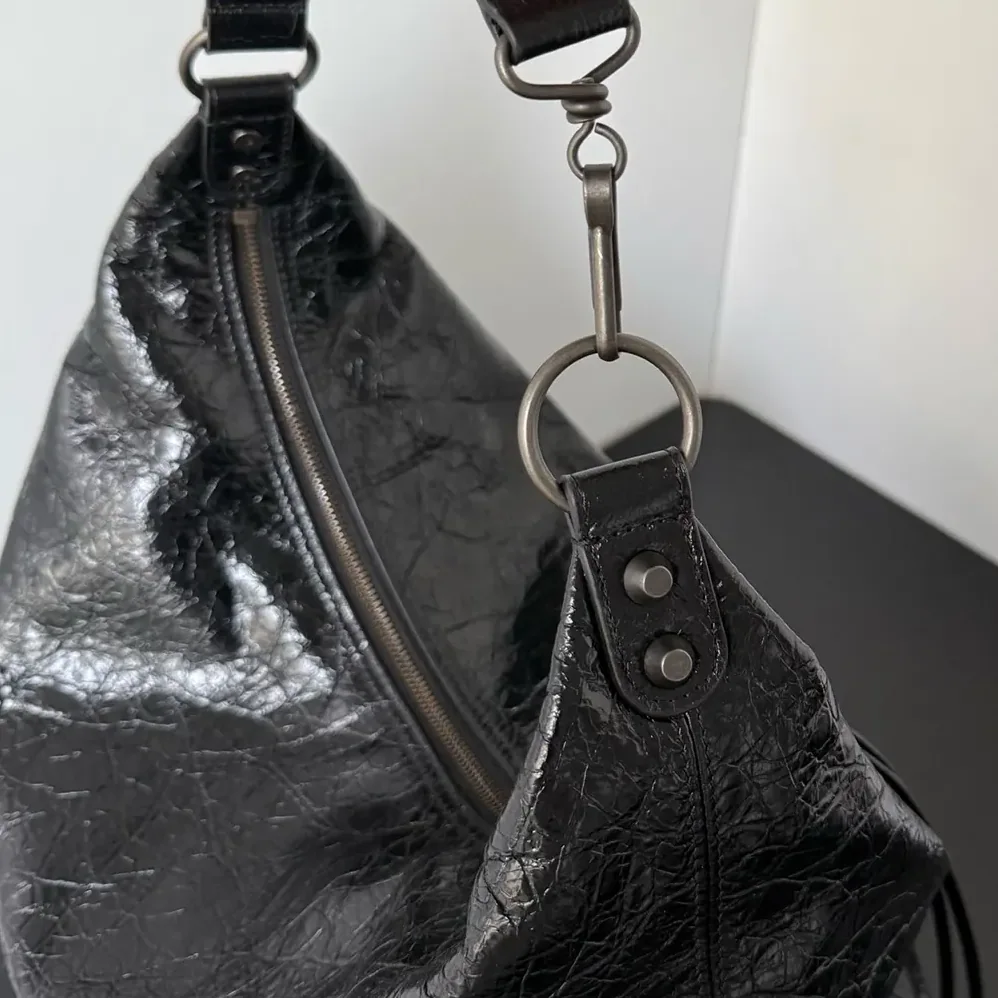 Balenciaga Le City Hobo Bag Medium in Black Arena Lambskin Brass Hardware for Women