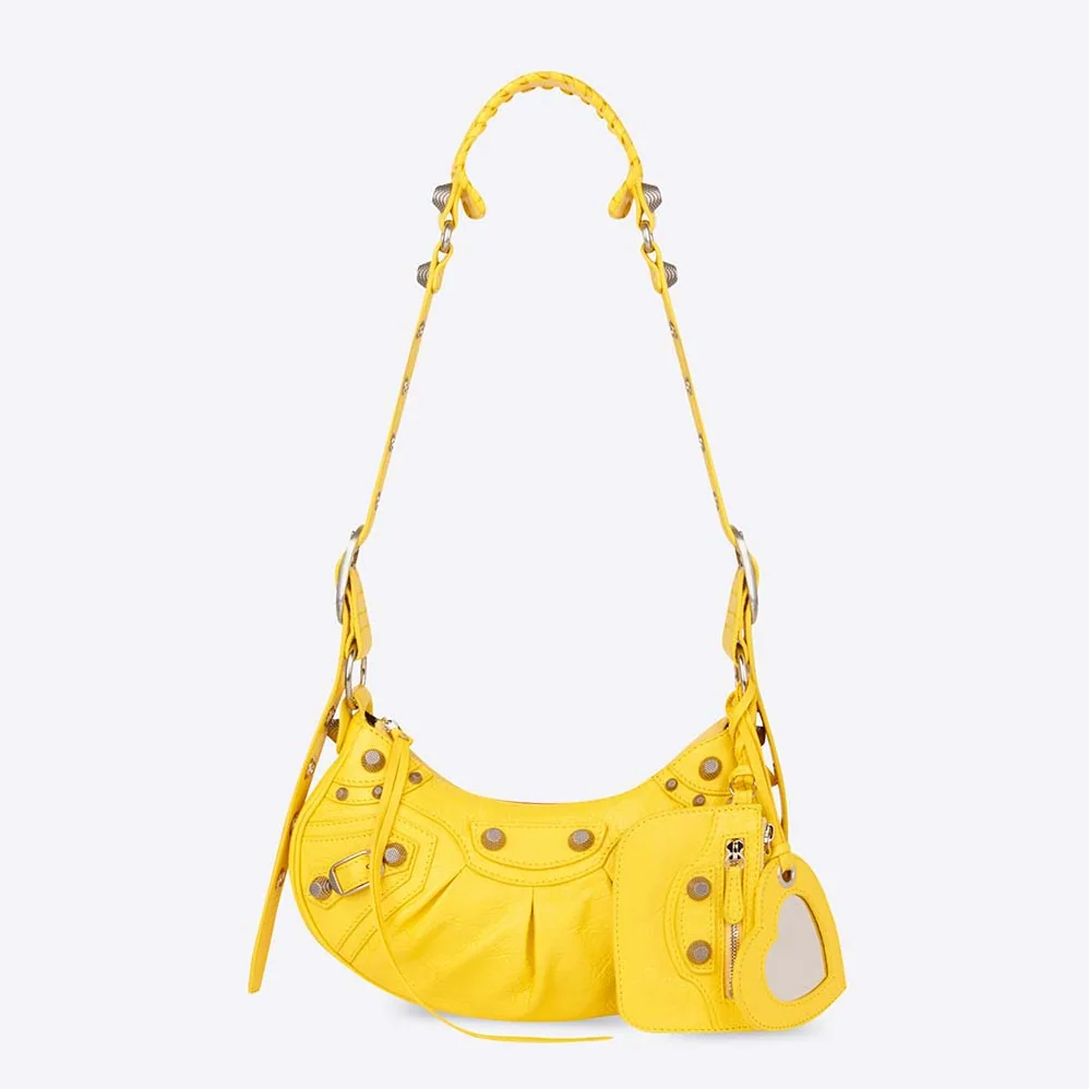 Balenciaga Le Cagole XS Shoulder Bag in Yellow for Women Balenciaga Le Cagole XS Shoulder Bag in Yellow for Women