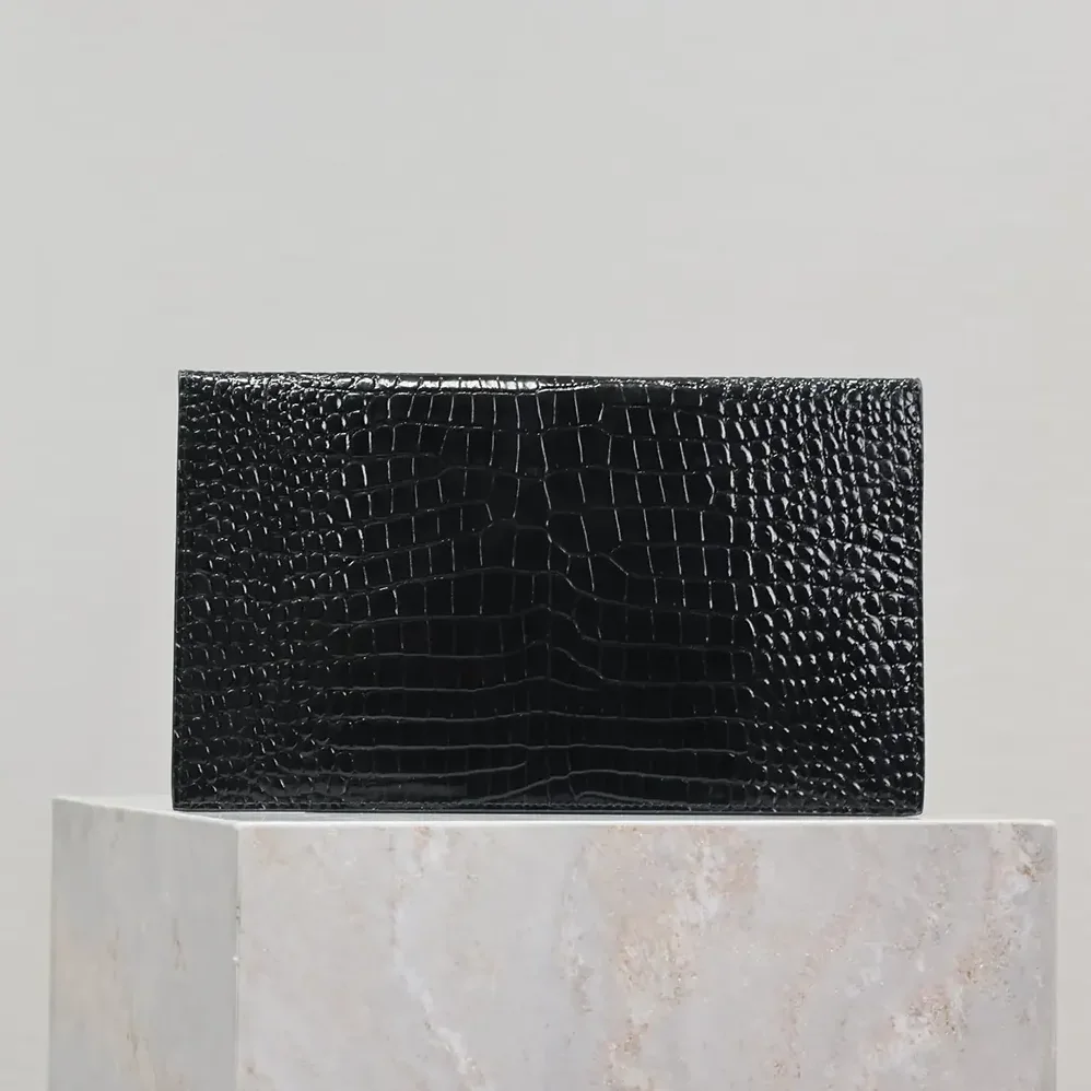 Saint Laurent YSL Uptown Pouch in Crocodile-embossed Shiny Leather for Women in Black