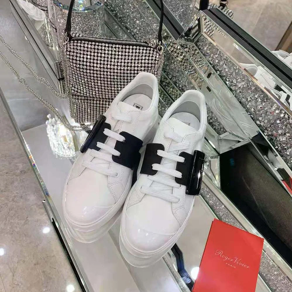 Roger Vivier Viv Skate Lacquered Buckle Sneakers in Soft Leather for Women in Black Roger Vivier Viv Skate Lacquered Buckle Sneakers in Soft Leather for Women in Black