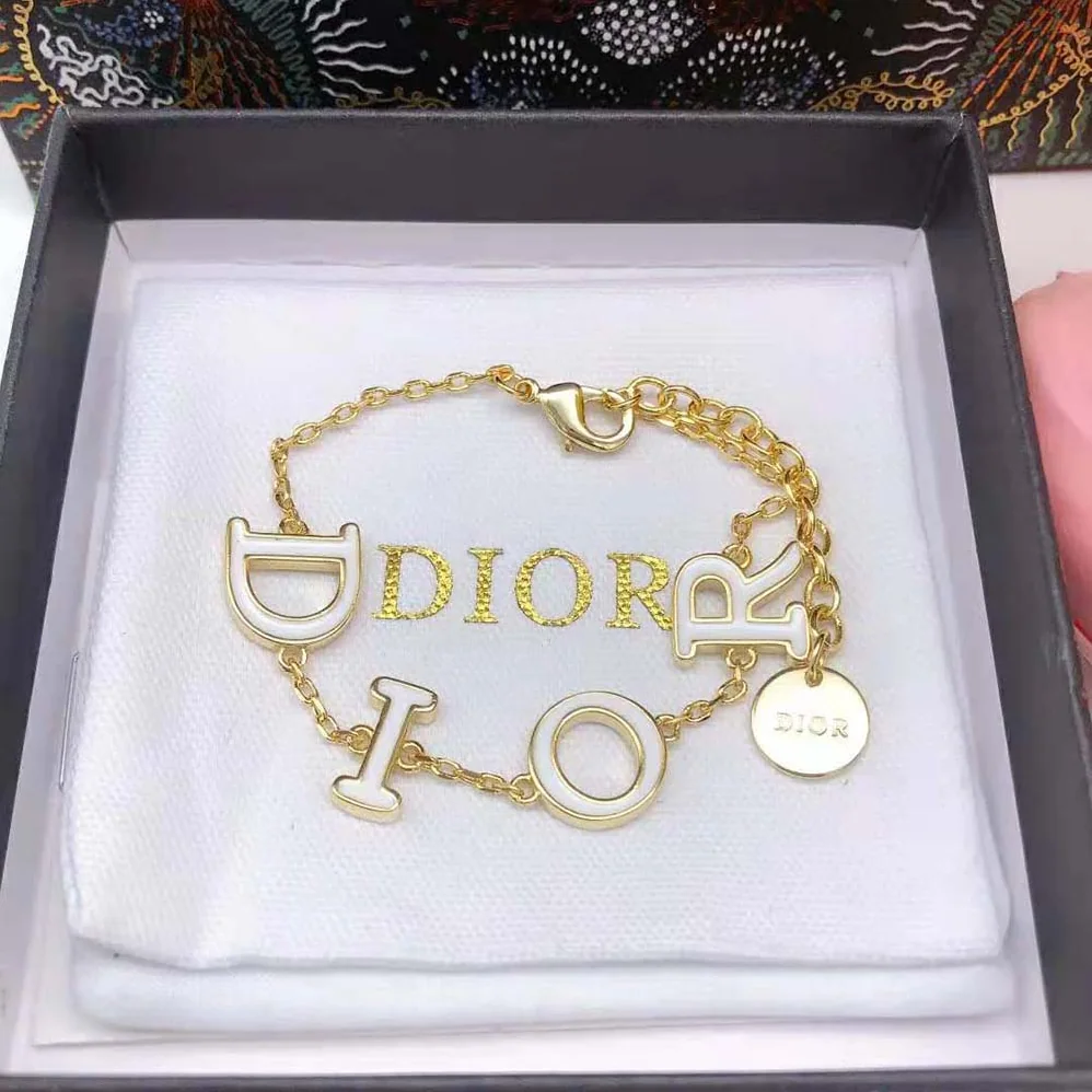 Dior Dio(r)evolution Bracelet Gold-Finish Metal and White Lacquer for Women Dior Dio(r)evolution Bracelet Gold-Finish Metal and White Lacquer for Women
