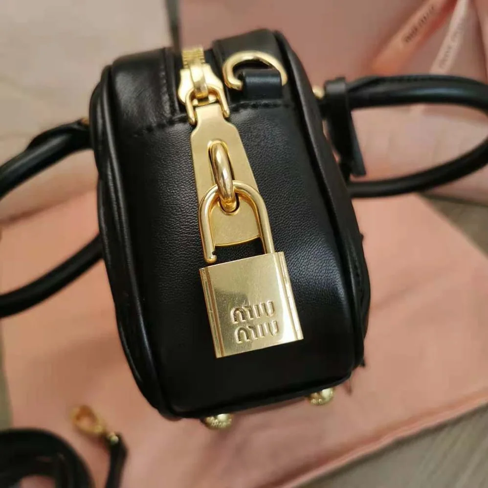 Miu Miu Matelassé Nappa Leather Top-Handle Bag for Women in Black