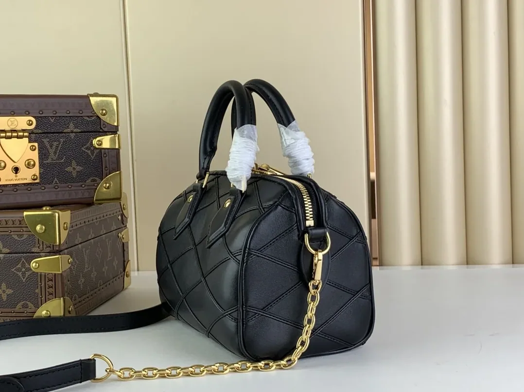 Louis Vuitton Speedy Bandouliere 25 Top Handle Bag in Black Gold Hardware
