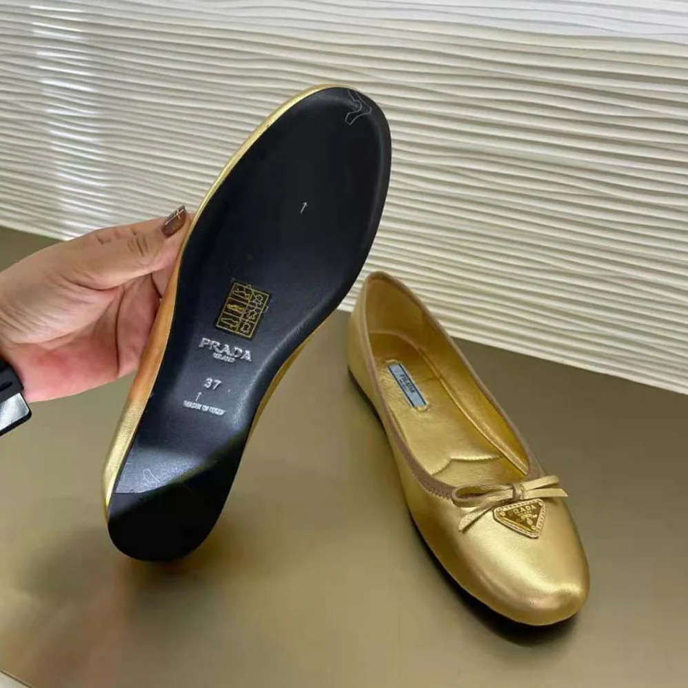 Prada Nappa Leather Ballerinas for Women in Gold Prada Nappa Leather Ballerinas for Women in Gold
