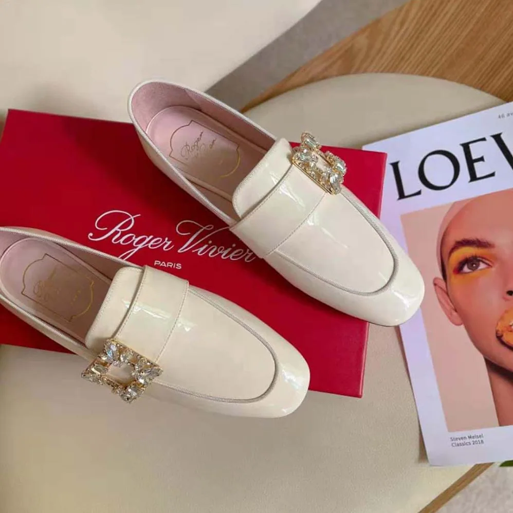 Roger Vivier Mini Broche Vivier Buckle Loafers in Patent Leather for Women in White Roger Vivier Mini Broche Vivier Buckle Loafers in Patent Leather for Women in White