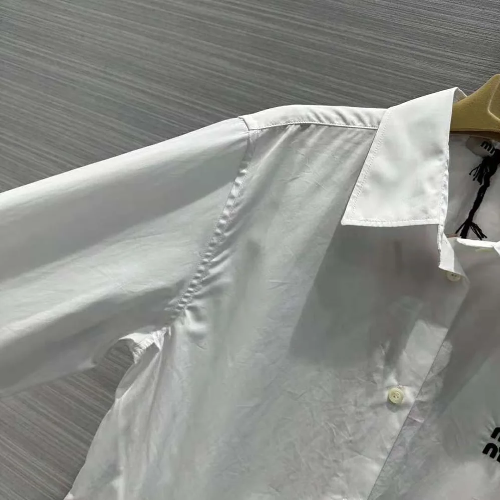 Miu Miu Poplin Mini for Women in Dress with Embroidered Logo Miu Miu Poplin Mini for Women in Dress with Embroidered Logo