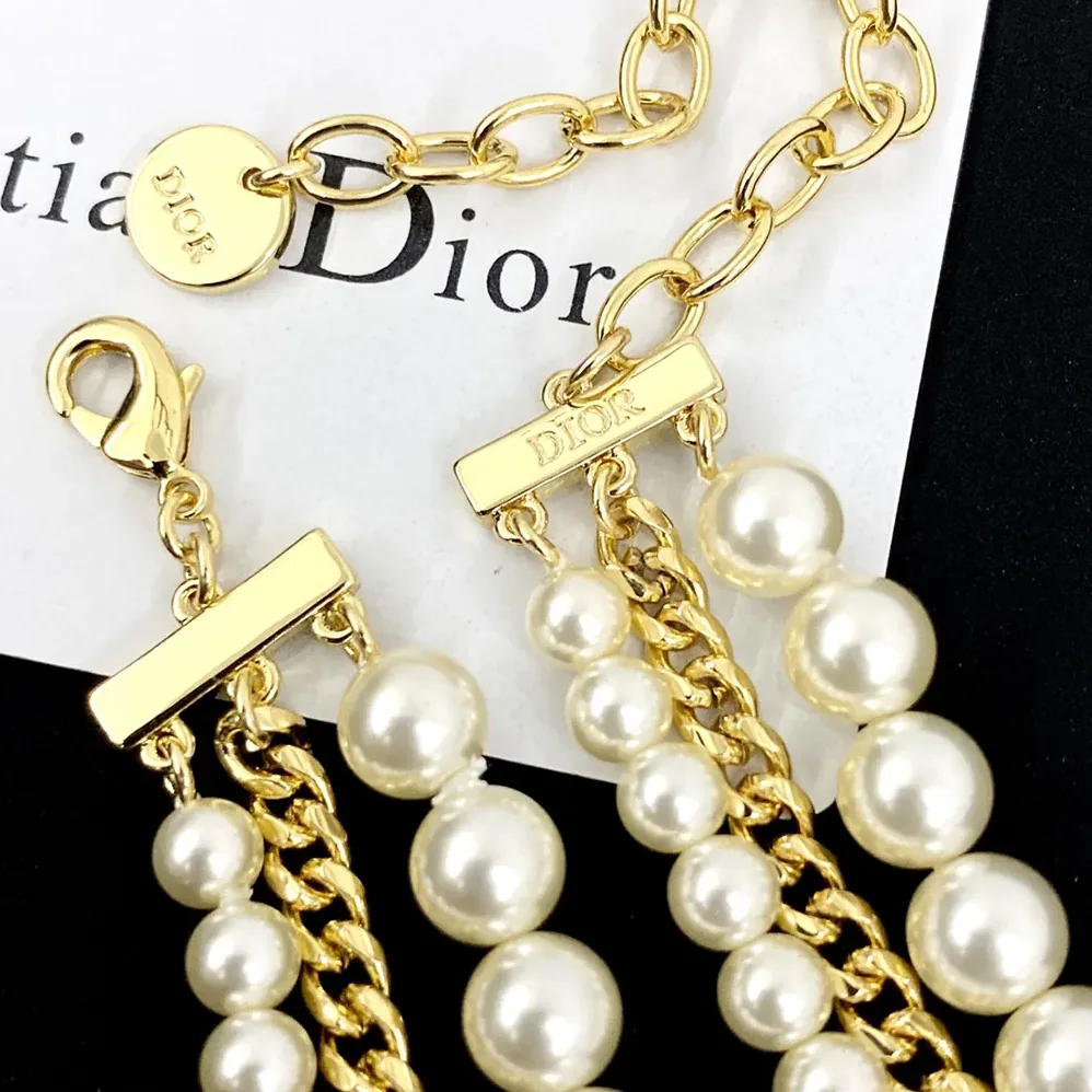 Dior Le Nœud de Dior Choker Gold-Finish Metal with White Resin Pearls and Black Satin for Women Dior Le Nœud de Dior Choker Gold-Finish Metal with White Resin Pearls and Black Satin for Women