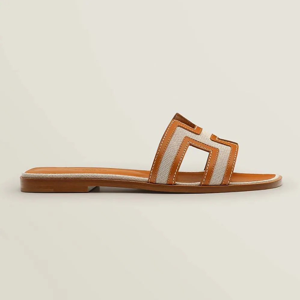Hermes Oran Sandal in Calfskin and H Canvas with Iconic H Cut for Women in Out Hermes Oran Sandal in Calfskin and H Canvas with Iconic H Cut for Women in Out