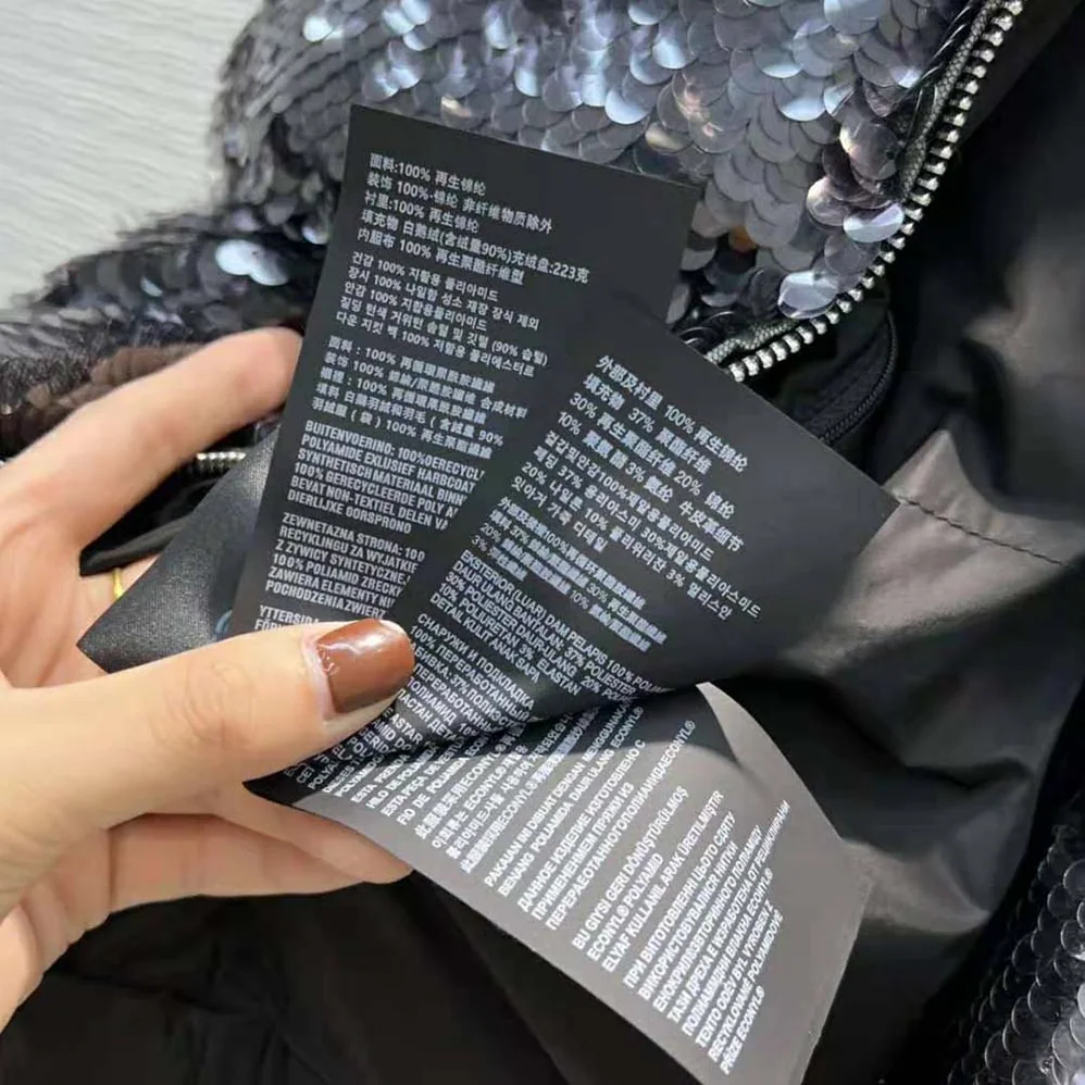 Prada Convertible Sequined Re-Nylon Down Jacket for Women in Black Prada Convertible Sequined Re-Nylon Down Jacket for Women in Black