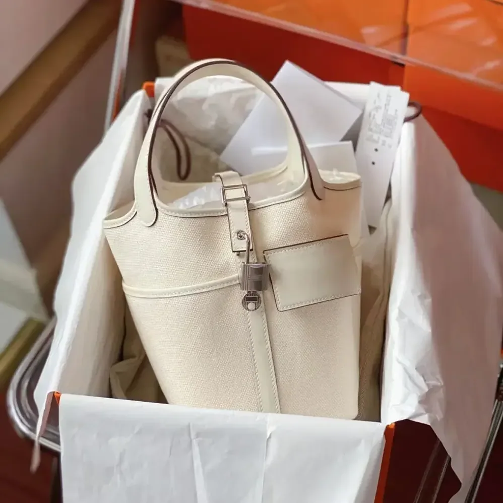 Hermes Picotin Lock 18 Pockets in Goeran Canvas Leather for Women in White Hermes Picotin Lock 18 Pockets in Goeran Canvas Leather for Women in White