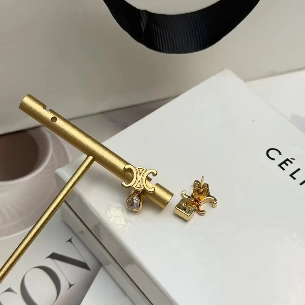 Celine Triomphe Twinkle Earrings in Strass and Brass with Gold Finish for Women