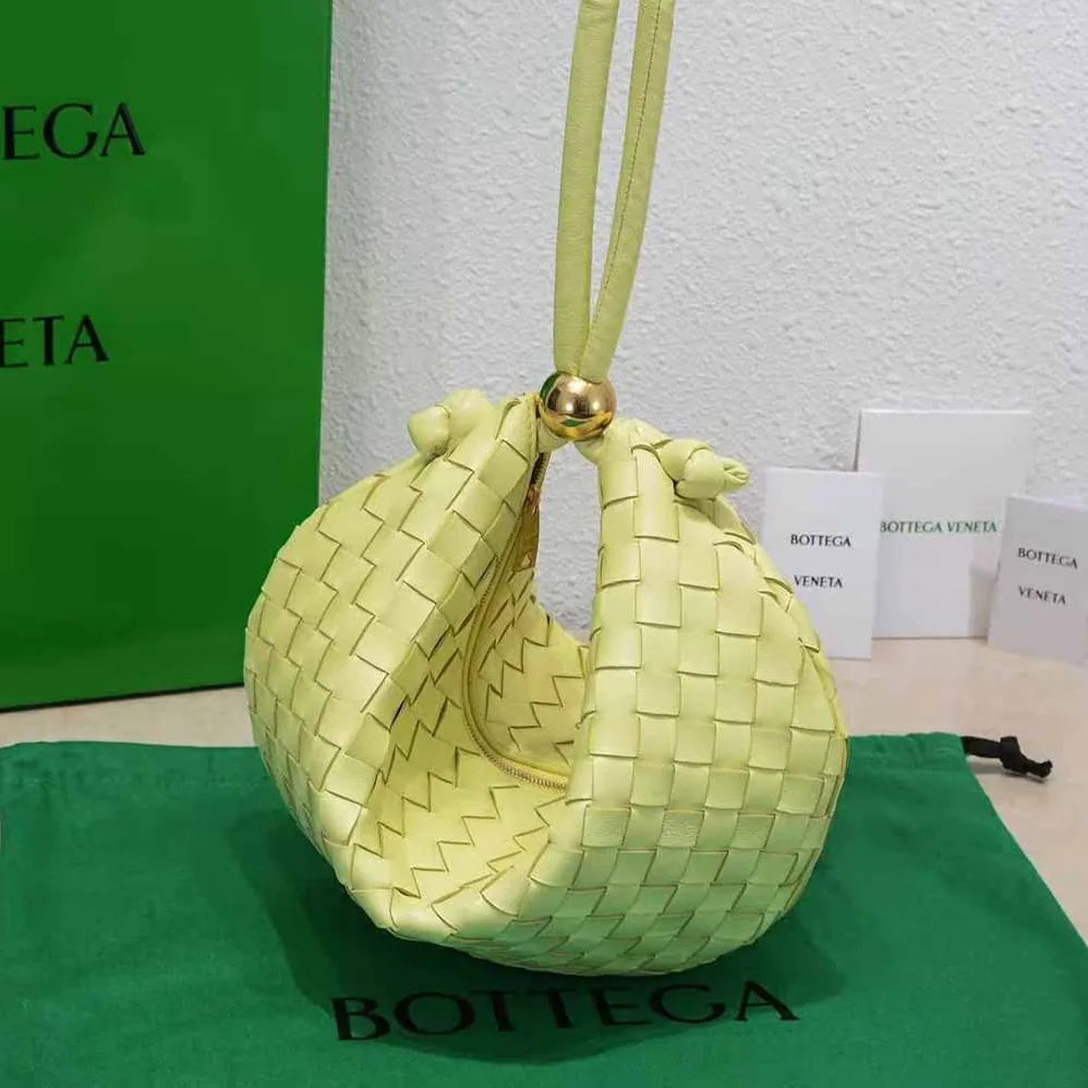 Bottega Veneta Turn Medium Intrecciato Leather Pouch with Adjustable Strap for Women in Yellow Bottega Veneta Turn Medium Intrecciato Leather Pouch with Adjustable Strap for Women in Yellow