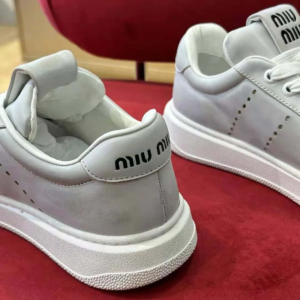 Miu Miu Bleached Leather Sneakers for Women in White