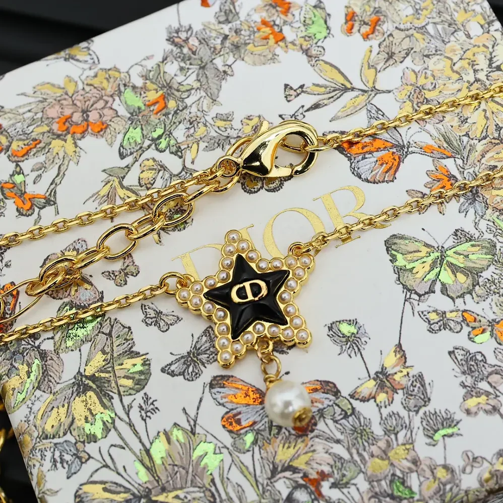 Dior Petit CD Lucky Baroque Necklace Gold-Finish Metal with White Resin Pearls and Deep Ocean Blue Glass for Women Dior Petit CD Lucky Baroque Necklace Gold-Finish Metal with White Resin Pearls and Deep Ocean Blue Glass for Women
