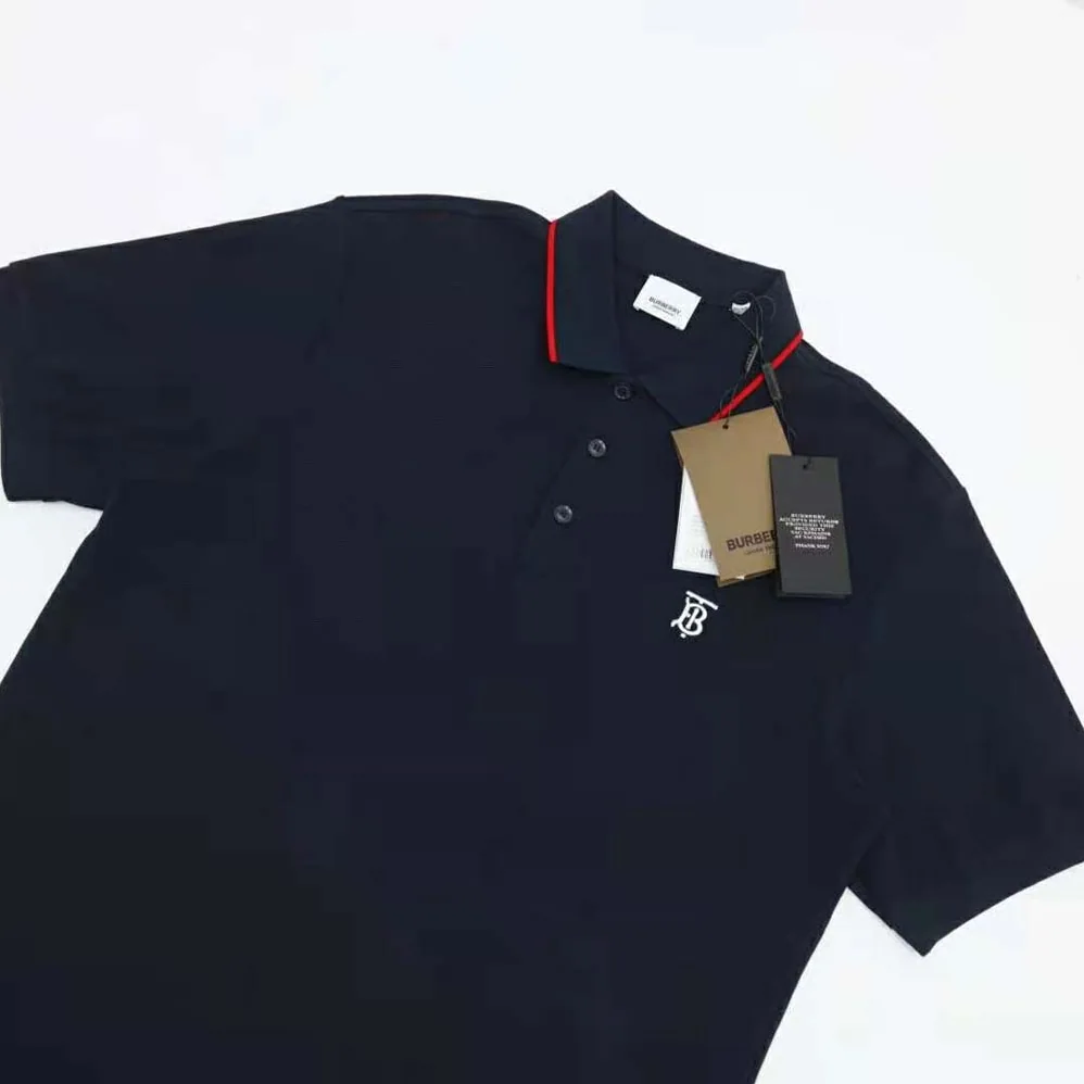Burberry Icon Stripe Placket Cotton Piqué Polo Shirt for Men in Navy Burberry Icon Stripe Placket Cotton Piqué Polo Shirt for Men in Navy