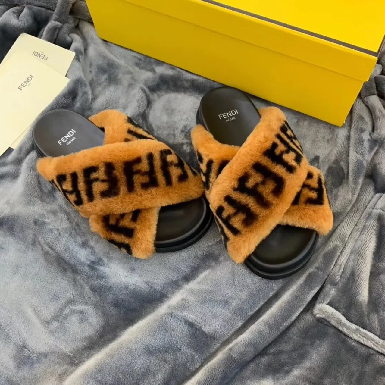 Fendi Shearling FF Logo Leather & Dyed Shearling Fur Cross Slides Fall/Winter 2019 Collection, Black in Brown Fendi Shearling FF Logo Leather & Dyed Shearling Fur Cross Slides Fall/Winter 2019 Collection, Black in Brown