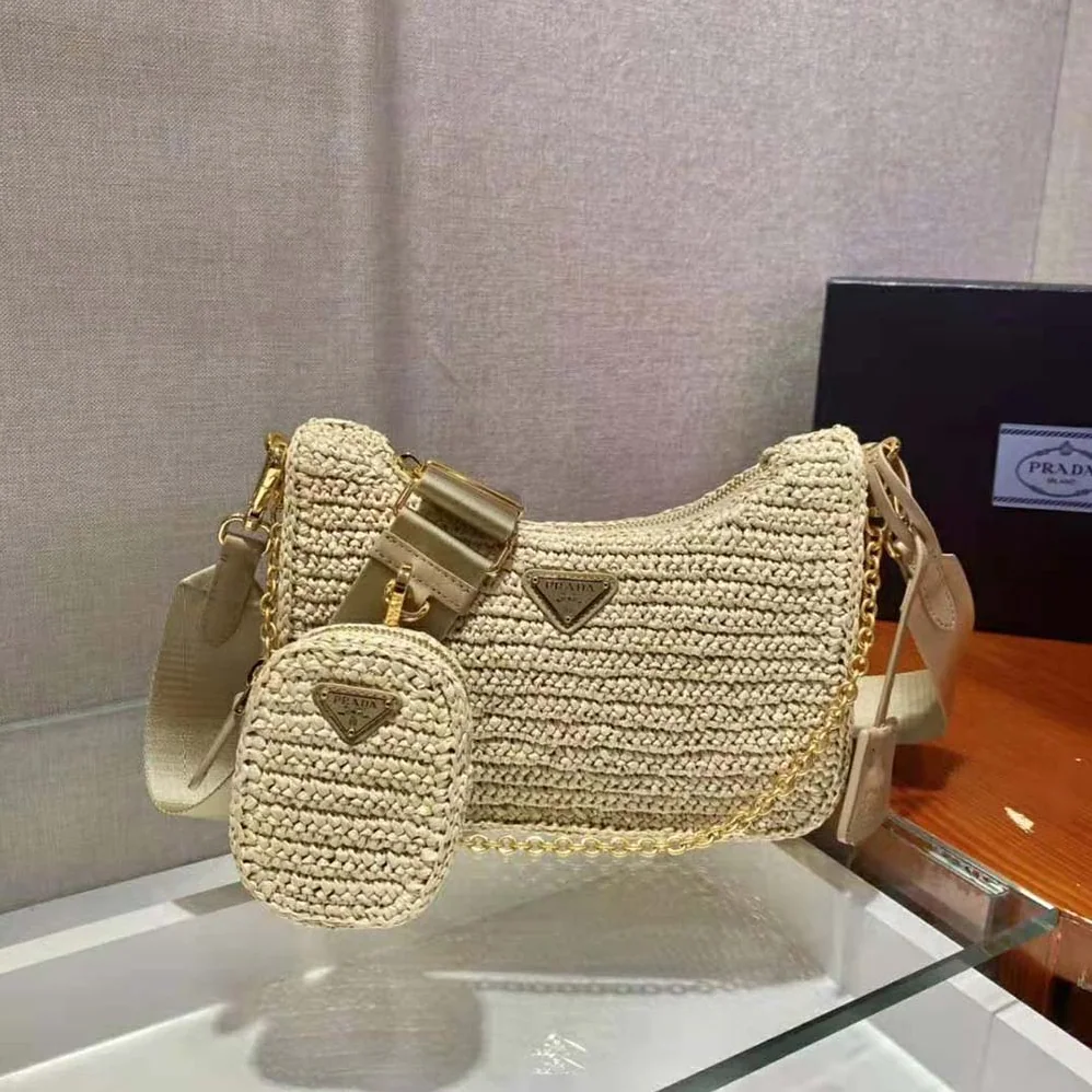 Prada Re-Edition 2005 Raffia Bag for Women in Natural Prada Re-Edition 2005 Raffia Bag for Women in Natural