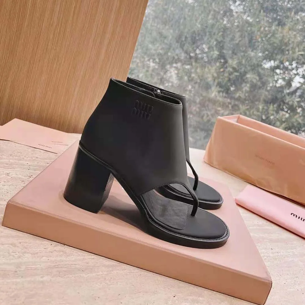 Miu Miu Leather Thong Booties for Women in Black