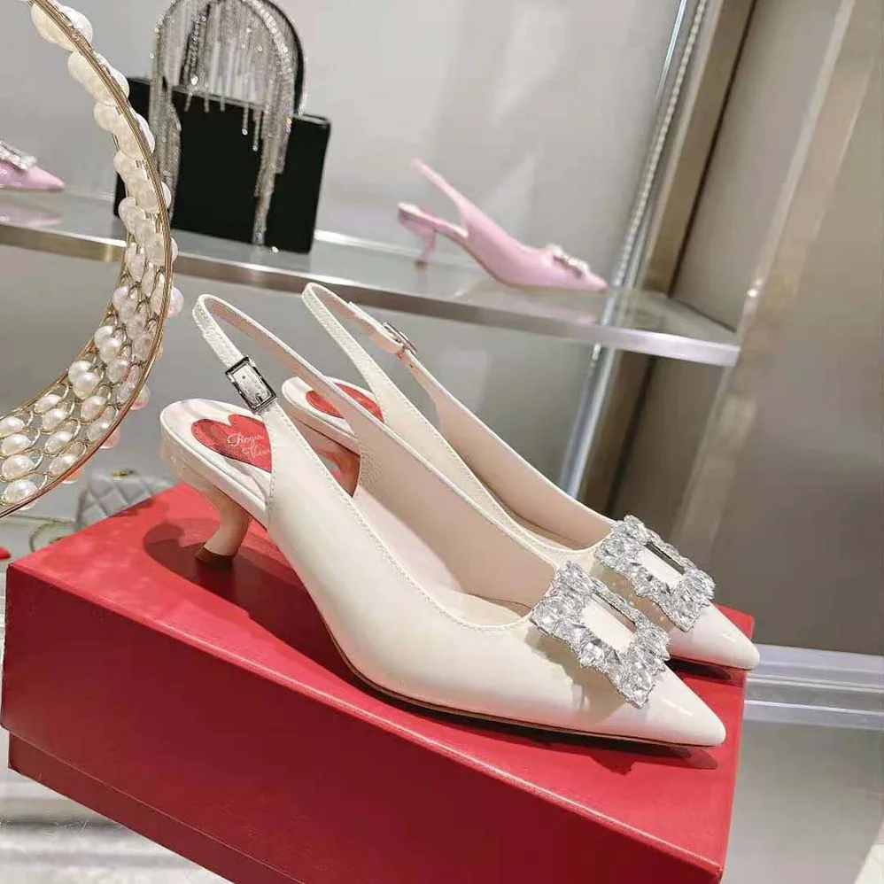 Roger Vivier Virgule Strass Buckle Slingback Pumps in Patent Leather for Women in White Roger Vivier Virgule Strass Buckle Slingback Pumps in Patent Leather for Women in White