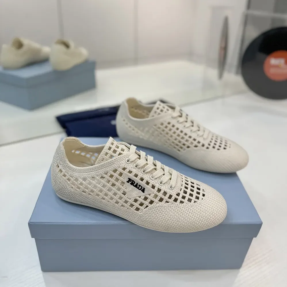 Prada Collapse Crochet Laced Sneakers for Unisex in White Prada Collapse Crochet Laced Sneakers for Unisex in White
