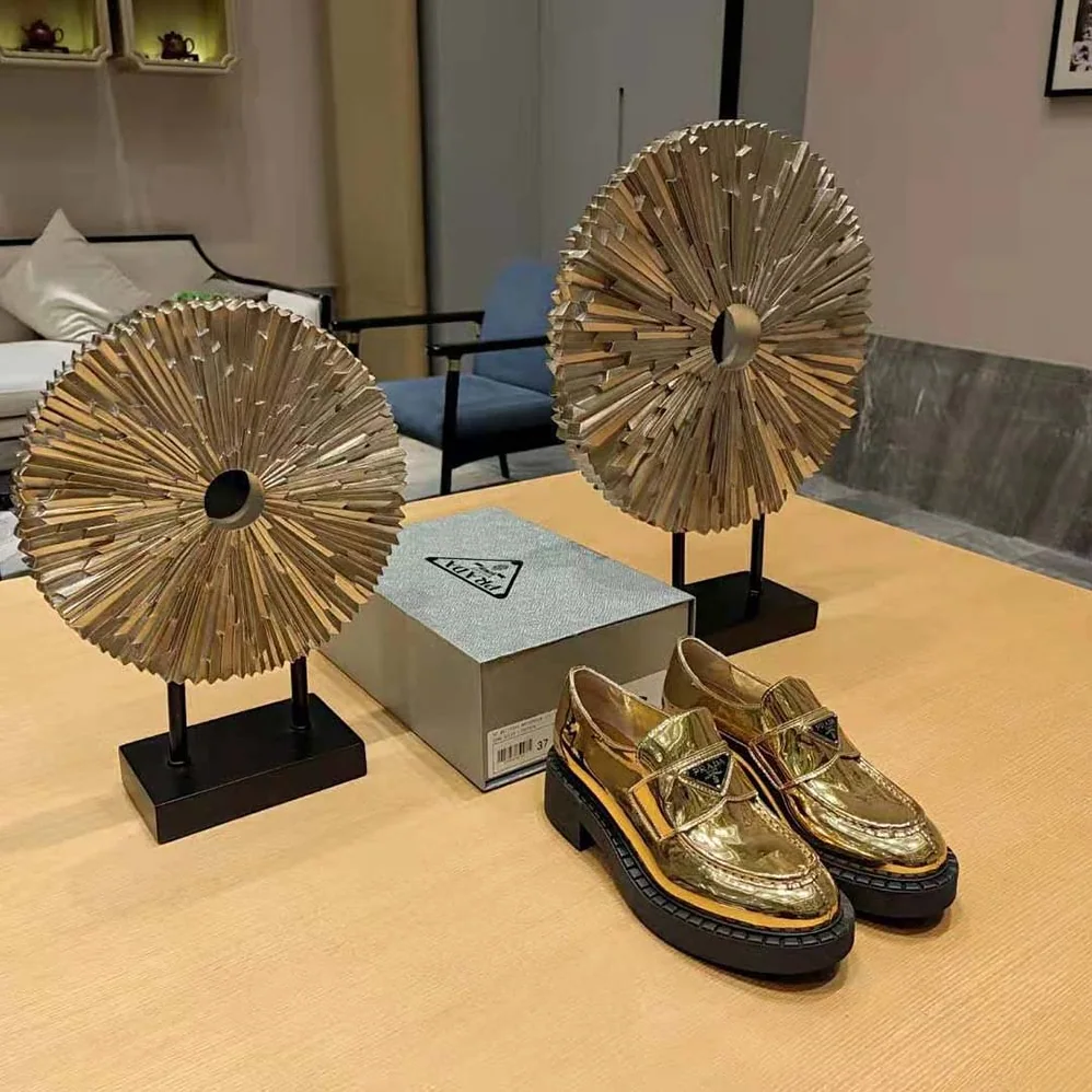 Prada Metallic Leather Loafers for Women in Gold