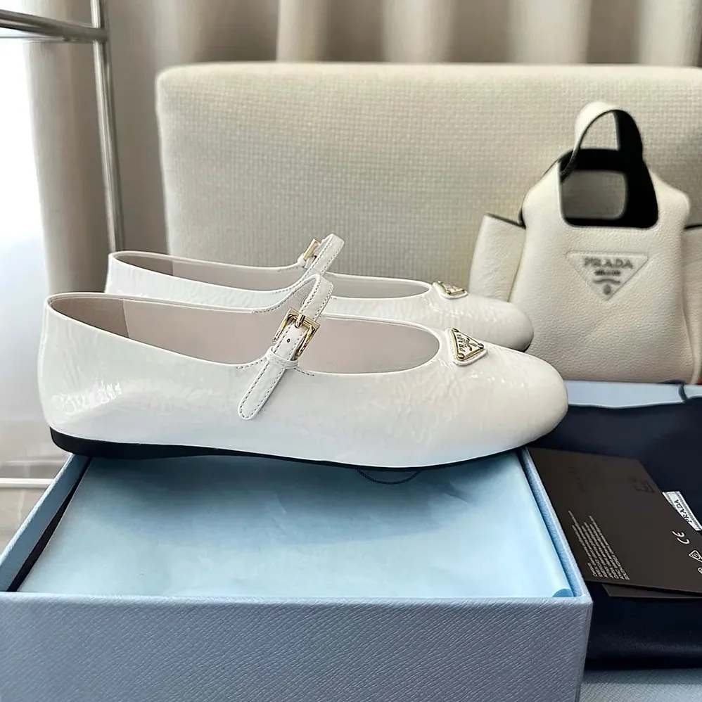 Prada Naplak Patent Leather Ballerinas for Women in White Prada Naplak Patent Leather Ballerinas for Women in White