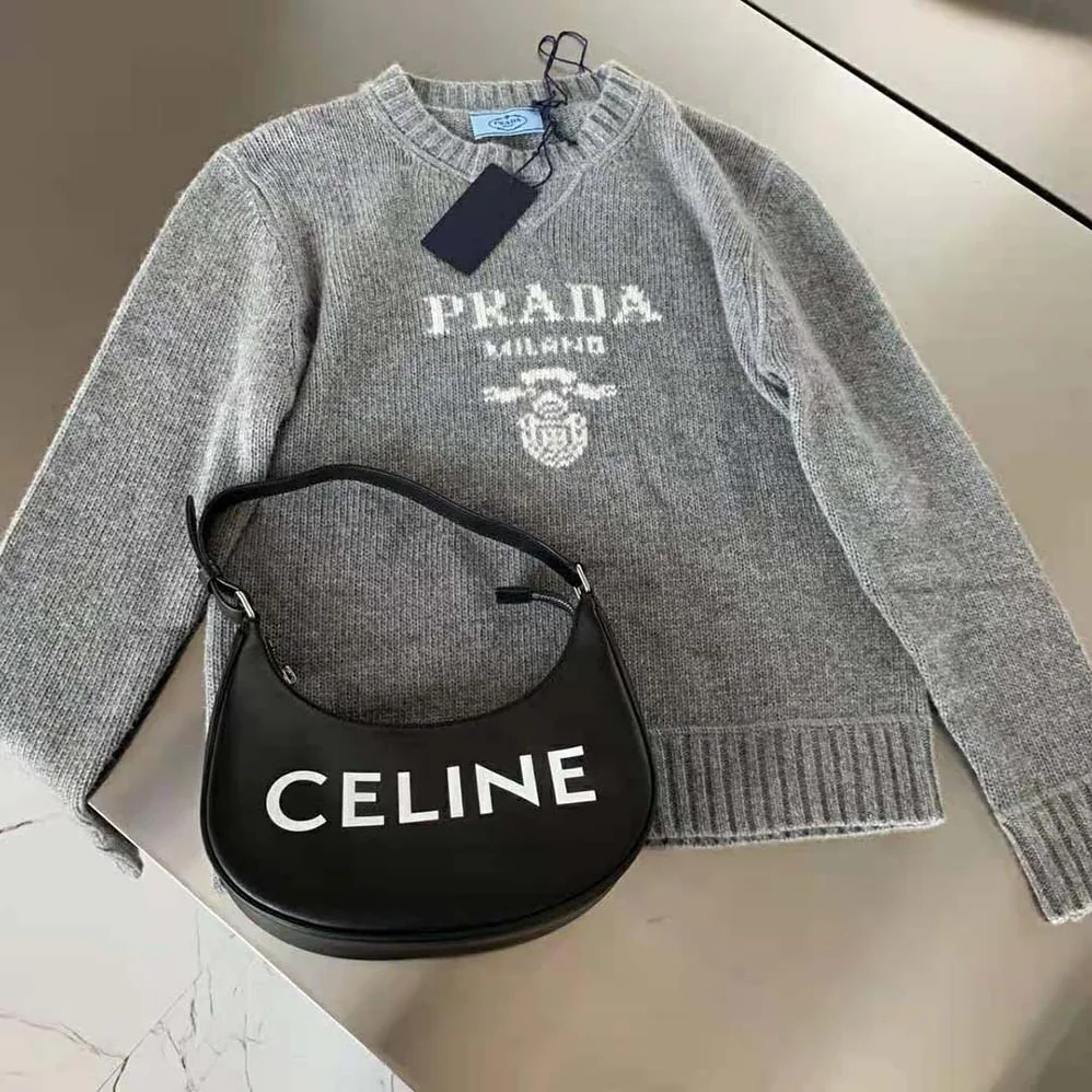Prada Cashmere and Wool Prada Logo Crew-Neck Sweater for Women in Silver Prada Cashmere and Wool Prada Logo Crew-Neck Sweater for Women in Silver