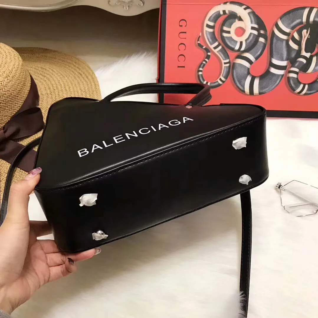 Balenciaga Triangle Duffle Small Calfskin Hand Carry and Shoulder Bag Balenciaga Triangle Duffle Small Calfskin Hand Carry and Shoulder Bag