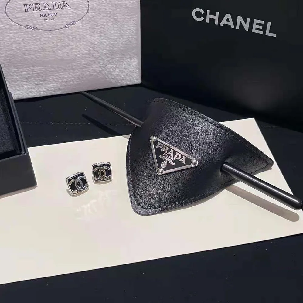 Prada Leather Hair Clip is Decorated with the Prada Logo for Women