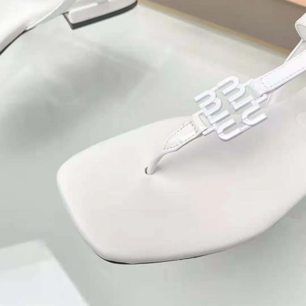 Miu Miu Patent Thong Sandals with Metal Lettering Logo for Women in White Miu Miu Patent Thong Sandals with Metal Lettering Logo for Women in White