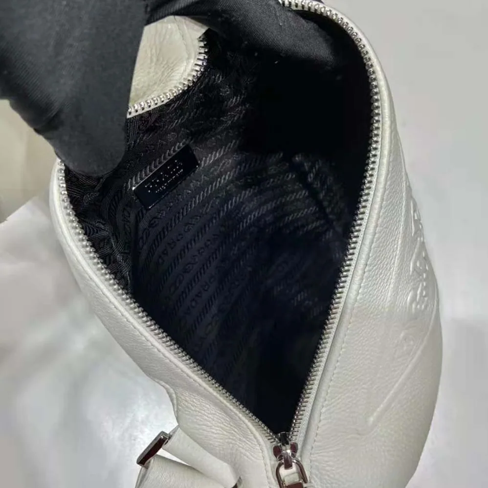 Prada Cross Leather Bag wite Logo-Print Re-Nylon lining for Men in White Prada Cross Leather Bag wite Logo-Print Re-Nylon lining for Men in White