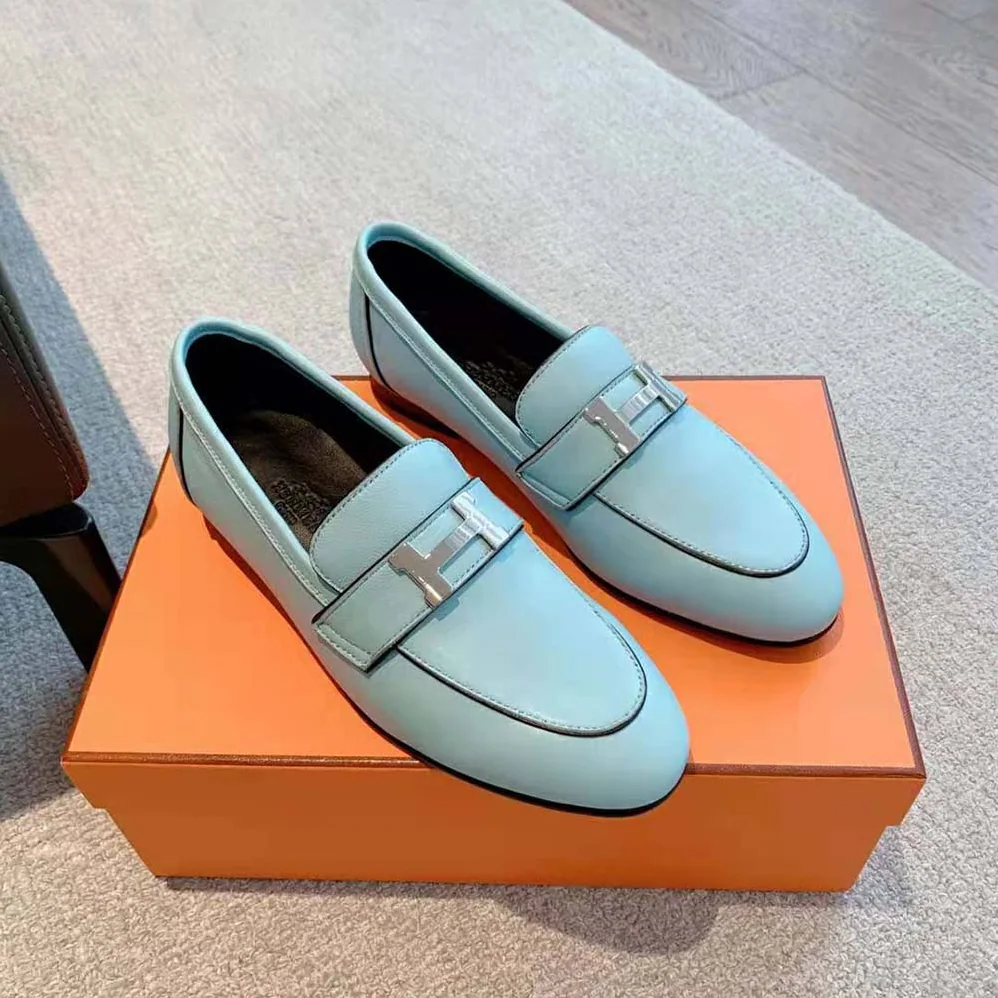 Hermes Paris Loafer in Calfskin with Palladium Plated Signature “H” Detail for Women in Blue Hermes Paris Loafer in Calfskin with Palladium Plated Signature “H” Detail for Women in Blue