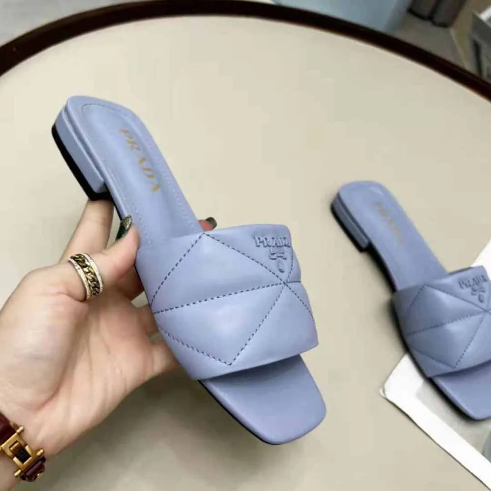 Prada Quilted Nappa Leather Sabots for Women in Blue