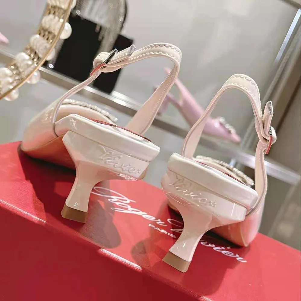 Roger Vivier Virgule Strass Buckle Slingback Pumps in Patent Leather for Women in White Roger Vivier Virgule Strass Buckle Slingback Pumps in Patent Leather for Women in White