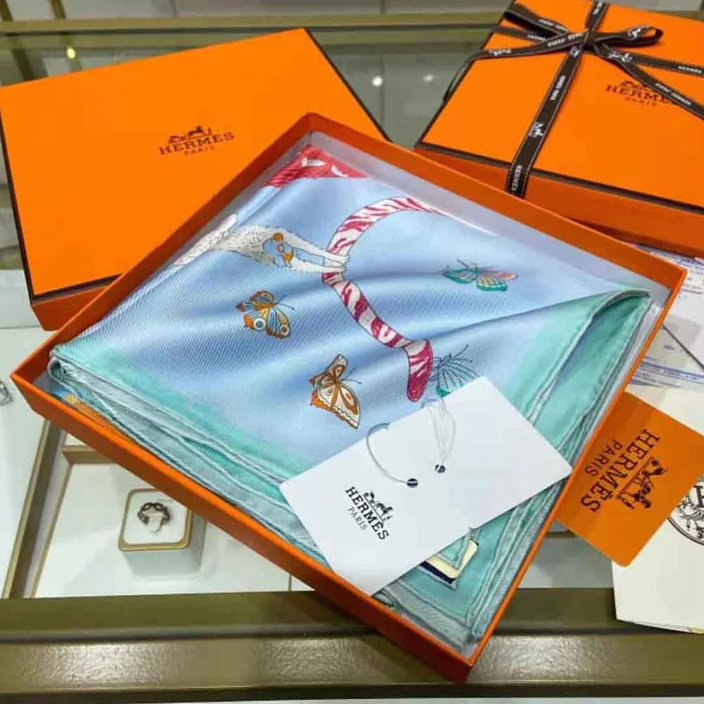 Hermes Hermes Story Scarf 90 in Silk Twill with Hand-Rolled Edges for Women in Blue