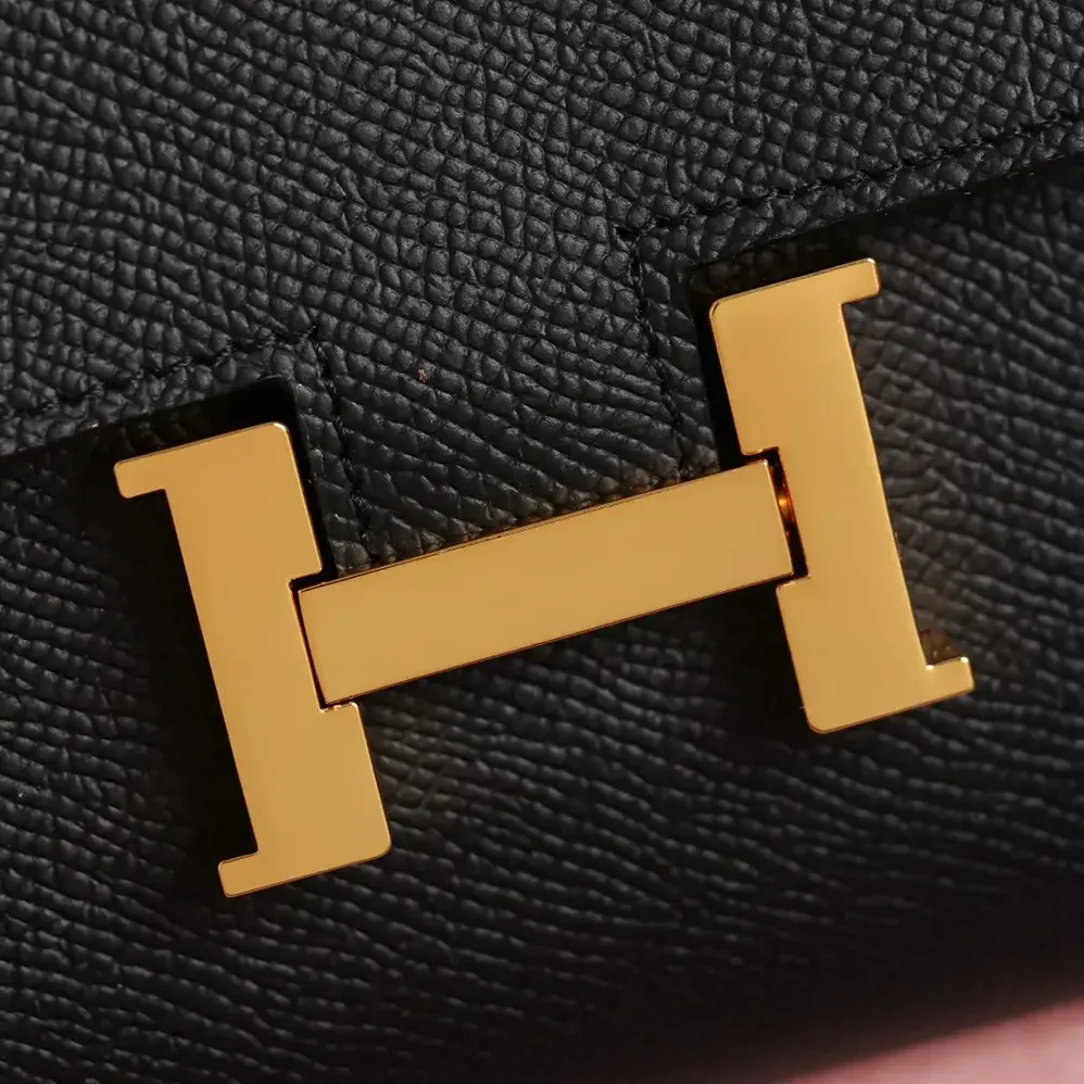 Hermes Constance Long To Go in Epsom Leather for Women in Black/Gold