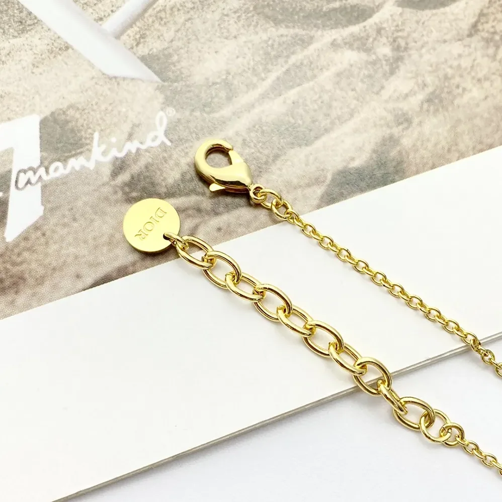 Dior Le Nœud de Dior Necklace Gold-Finish Metal with White Resin Pearl and Silver for Women in Tone Crystals Dior Le Nœud de Dior Necklace Gold-Finish Metal with White Resin Pearl and Silver for Women in Tone Crystals