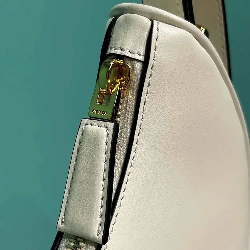Prada Arqué Mini Leather Shoulder Bag for Women in White Prada Arqué Mini Leather Shoulder Bag for Women in White