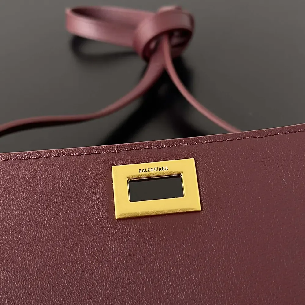 Balenciaga Bel Air Clutch On Strap Small in Dark Burgundy for Women Balenciaga Bel Air Clutch On Strap Small in Dark Burgundy for Women