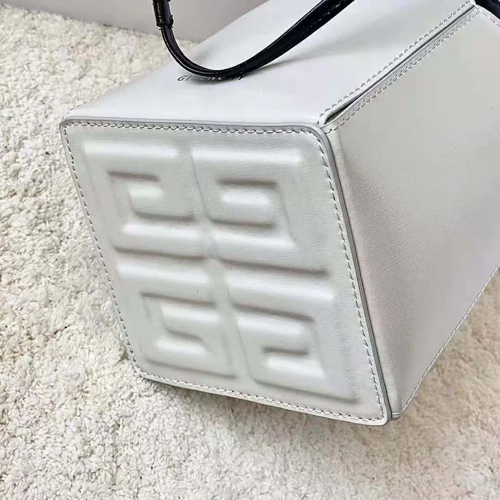 Givenchy Mini Cut Out Bucket Bag in Box Leather for Women in White Givenchy Mini Cut Out Bucket Bag in Box Leather for Women in White