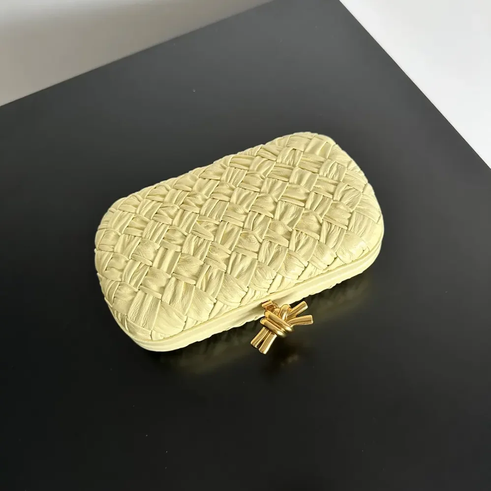 Bottega Veneta Knot Minaudière Clutch in Calfskin Leather for Women in Yellow Bottega Veneta Knot Minaudière Clutch in Calfskin Leather for Women in Yellow