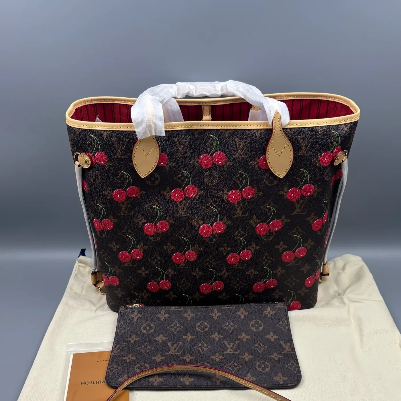 Louis Vuitton LV x TM Neverfull MM Tote Bag in Monogram Cherry Gold Hardware