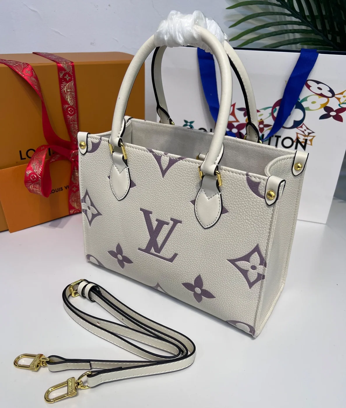 Louis Vuitton Onthego PM Tote Bag in Grey/Beige Gold Hardware