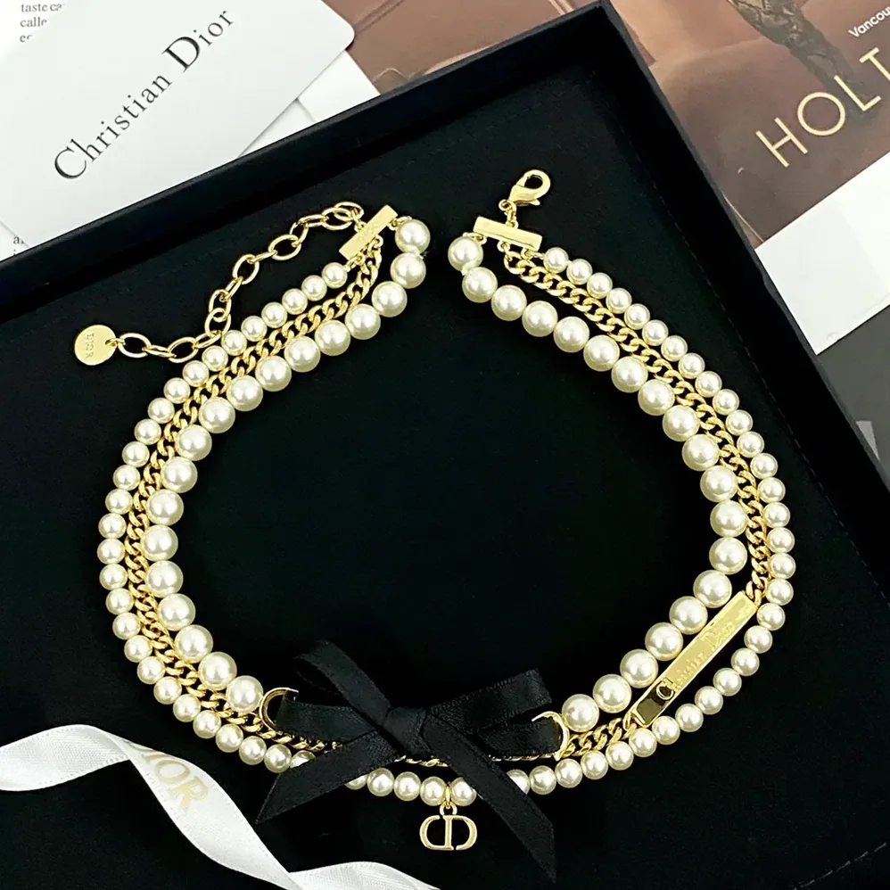 Dior Le Nœud de Dior Choker Gold-Finish Metal with White Resin Pearls and Black Satin for Women Dior Le Nœud de Dior Choker Gold-Finish Metal with White Resin Pearls and Black Satin for Women
