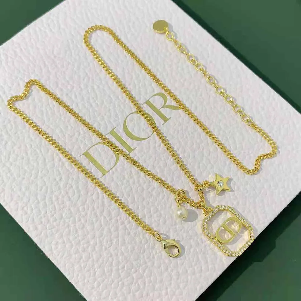 Dior Petit CD Necklace Gold-Finish Metal with a White Resin Pearl and White Crystals for Women Dior Petit CD Necklace Gold-Finish Metal with a White Resin Pearl and White Crystals for Women
