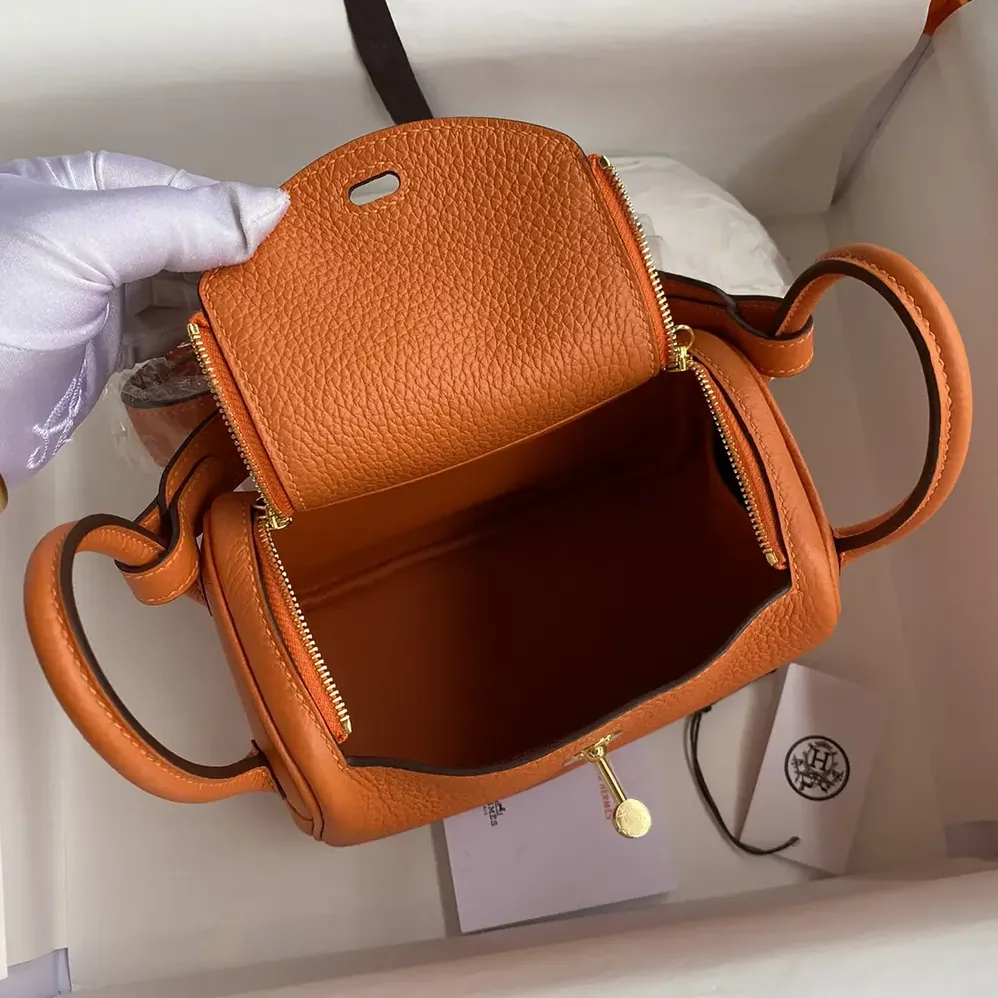 Hermes Lindy Mini 19 in Clemence Leather for Women in Orange/Gold Hermes Lindy Mini 19 in Clemence Leather for Women in Orange/Gold