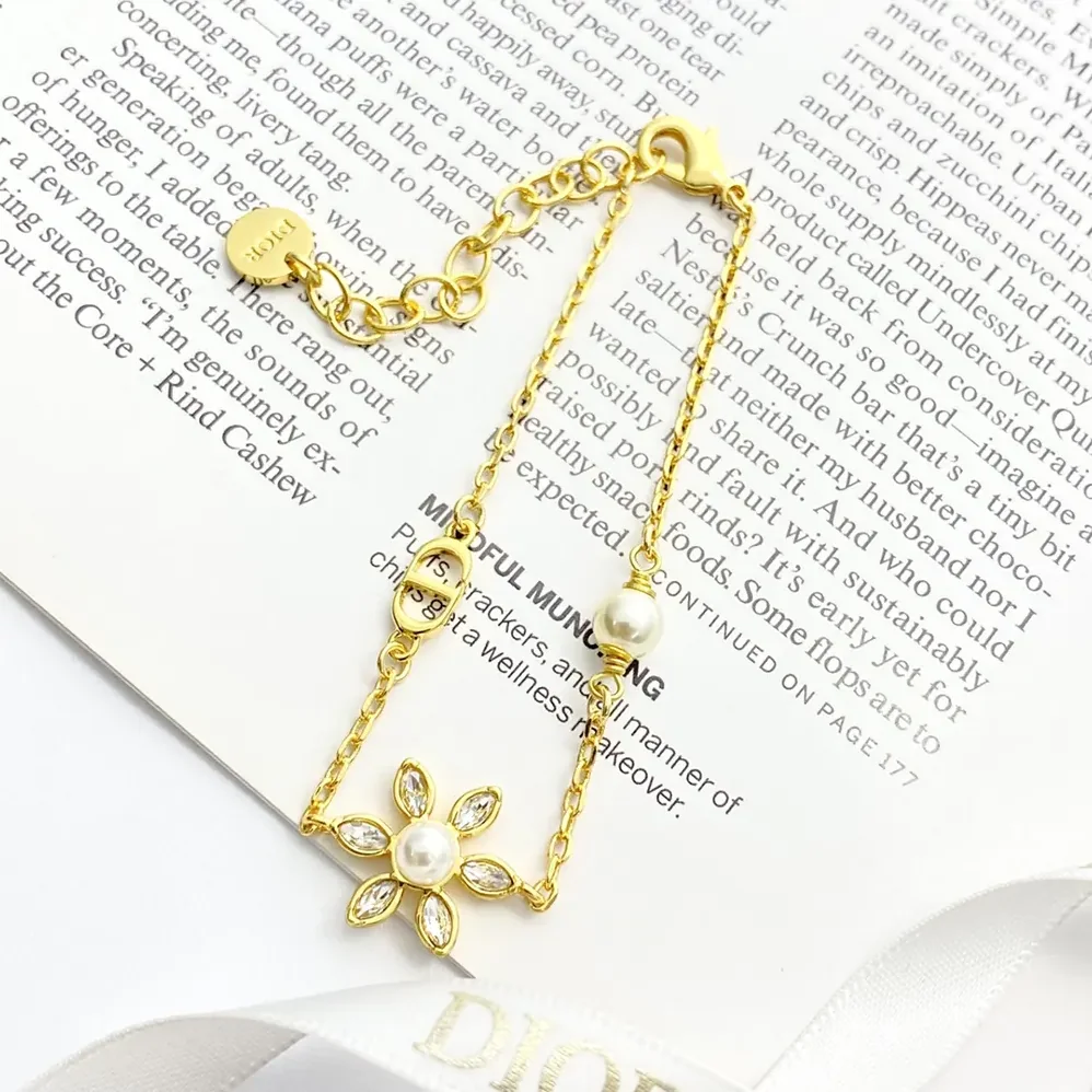 Dior Bloom in Dior Bracelet Gold-Finish Metal with White Resin Pearls and Silver for Women in Tone Crystals Dior Bloom in Dior Bracelet Gold-Finish Metal with White Resin Pearls and Silver for Women in Tone Crystals