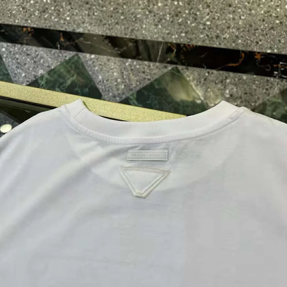 Prada Oversized Printed Jersey T-shirt for Women in White Prada Oversized Printed Jersey T-shirt for Women in White