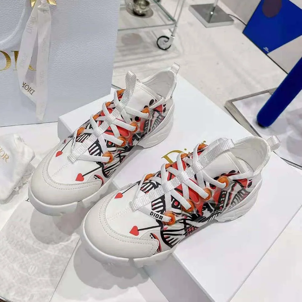 Dior D-Connect Sneaker White Technical Fabric with Red and Black Cupidon Print for Women Dior D-Connect Sneaker White Technical Fabric with Red and Black Cupidon Print for Women